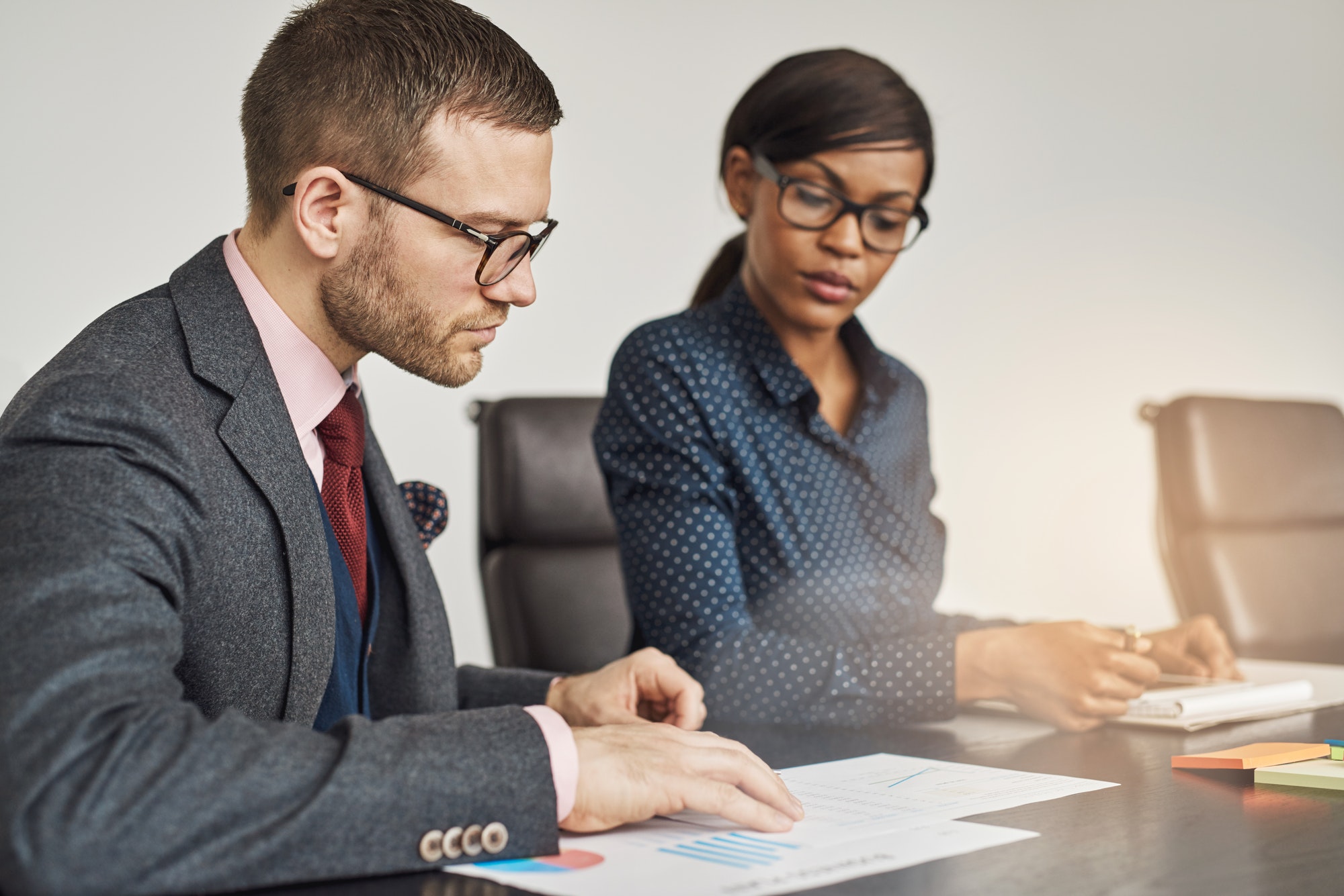 Businessman and women having a serious meeting